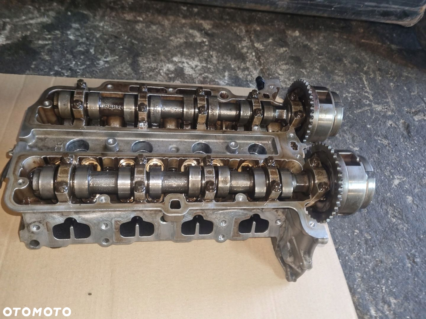 Głowica silnika Opel Corsa Meriva 1.2 16v A12XER 55562229 - 2