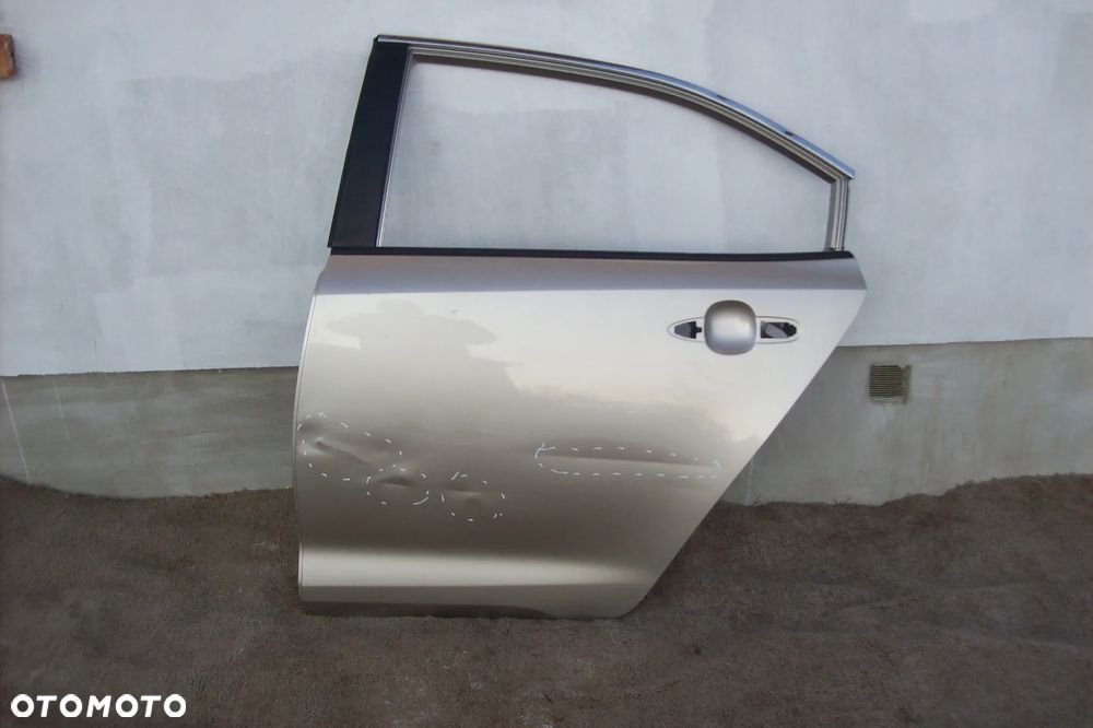 DRZWI TYLNE LEWE TOYOTA COROLLA E-21 SEDAN