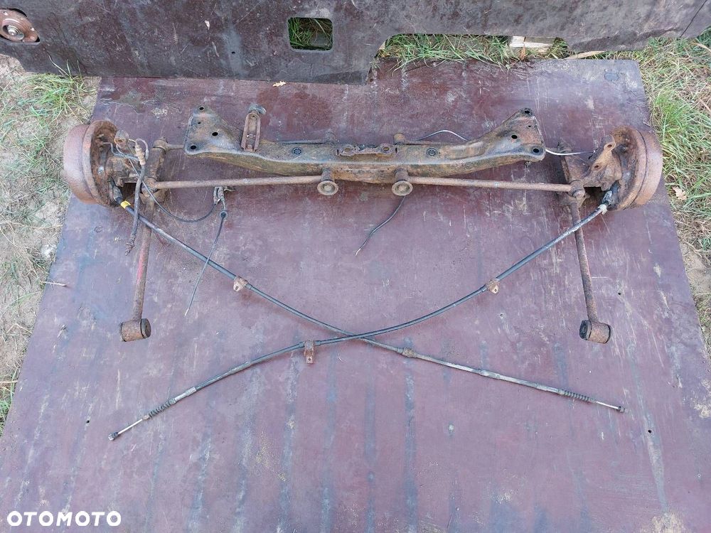 KOMPLETNE ZAWIESZENIE TYŁ TOYOTA COROLLA VII E100 SANKI BELKA TYŁ - 1