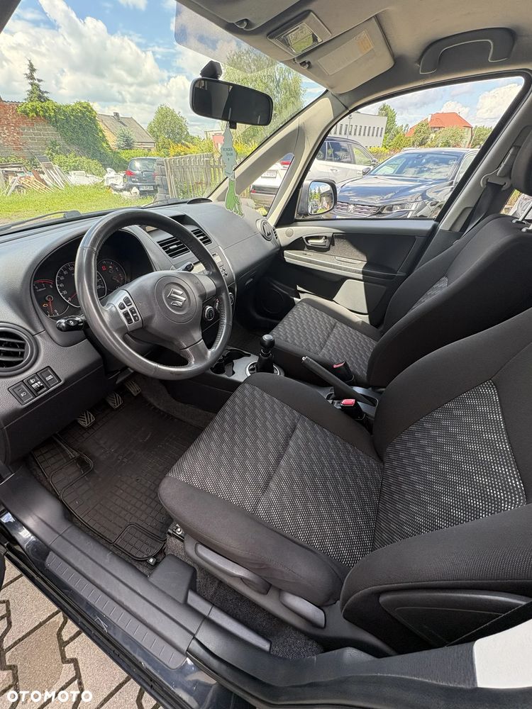 Suzuki SX4 1.6 GLX / Comfort - 9