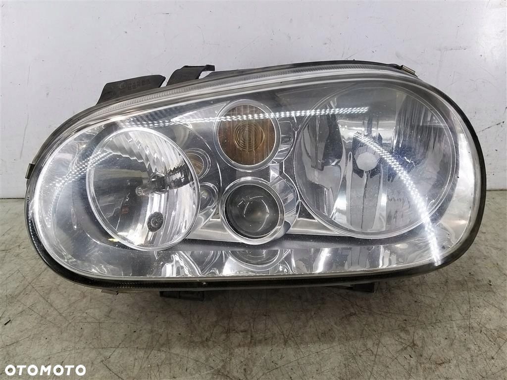 Reflektor lampa przód lewa VW Golf IV 1997-2003 HELLA 150145-00 - 1