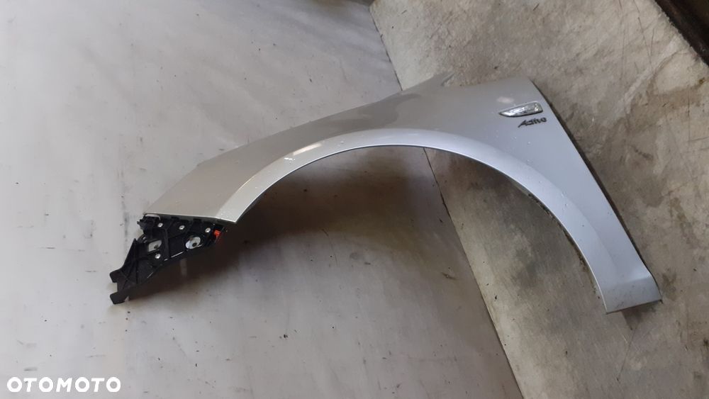 * BŁOTNIK LEWY OPEL ASTRA J IV do malowania Z176 SREBRNY - 3