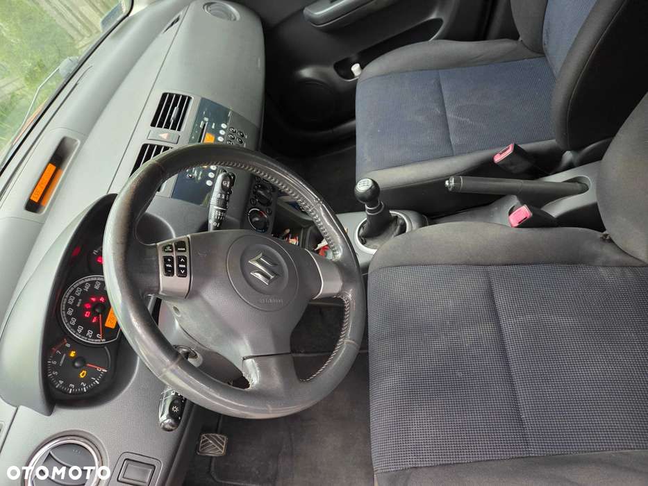 Suzuki Swift 1.3 Club - 7