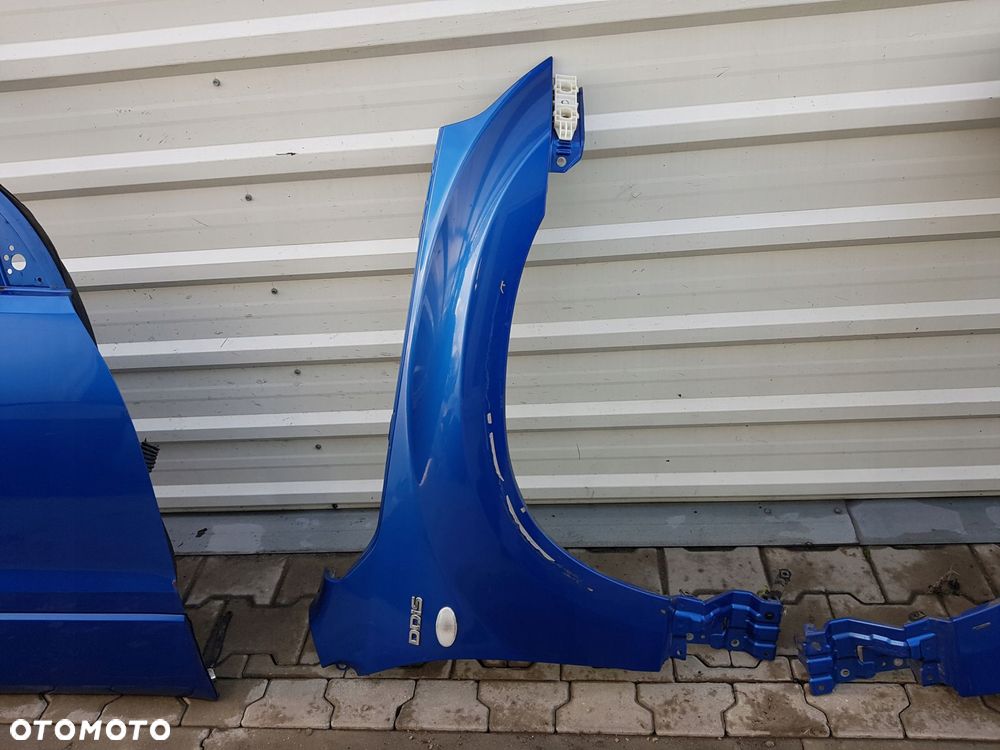 GRAND VITARA II 05r- BŁOTNIK PRAWY PRZÓD ZCW - 2