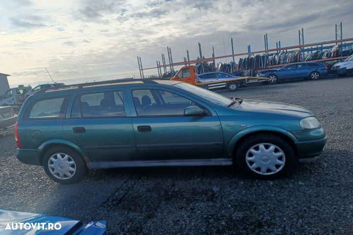 Alternator 0124425005  2447429 Opel Astra G [1998 - 2009] wagon 5-usi - 5