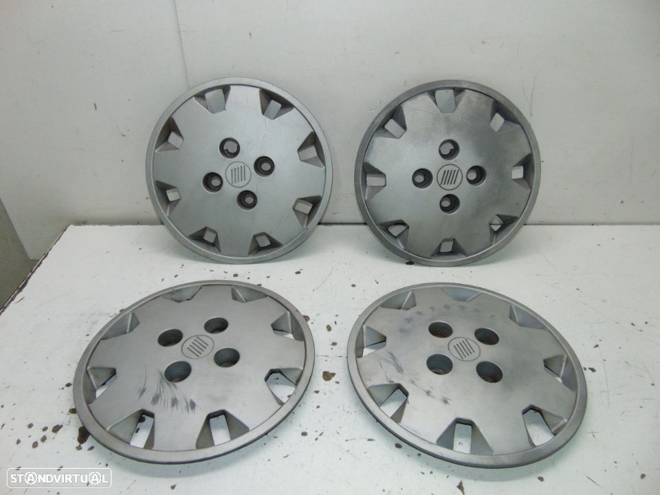 Fiat uno dos 1 jogo de tampões de roda - 1