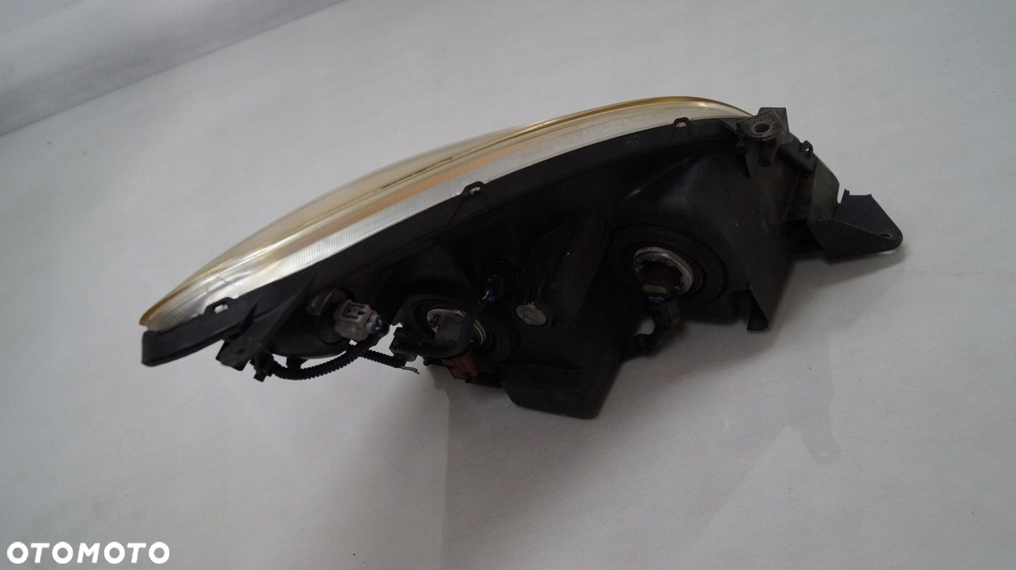 LAMPA PRZEDNIA LEWA TOYOTA COROLLA VERSO II - 8