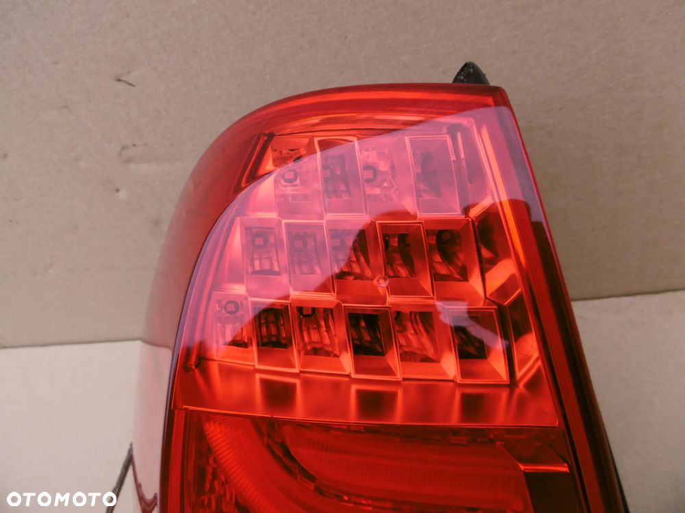 lampa tył tylna lewa bmw e91 lci lift polift w błotnik 7289431 - 2