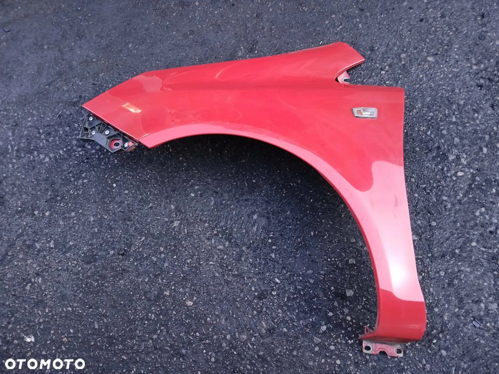 Opel Corsa D Błotnik lewy - 1