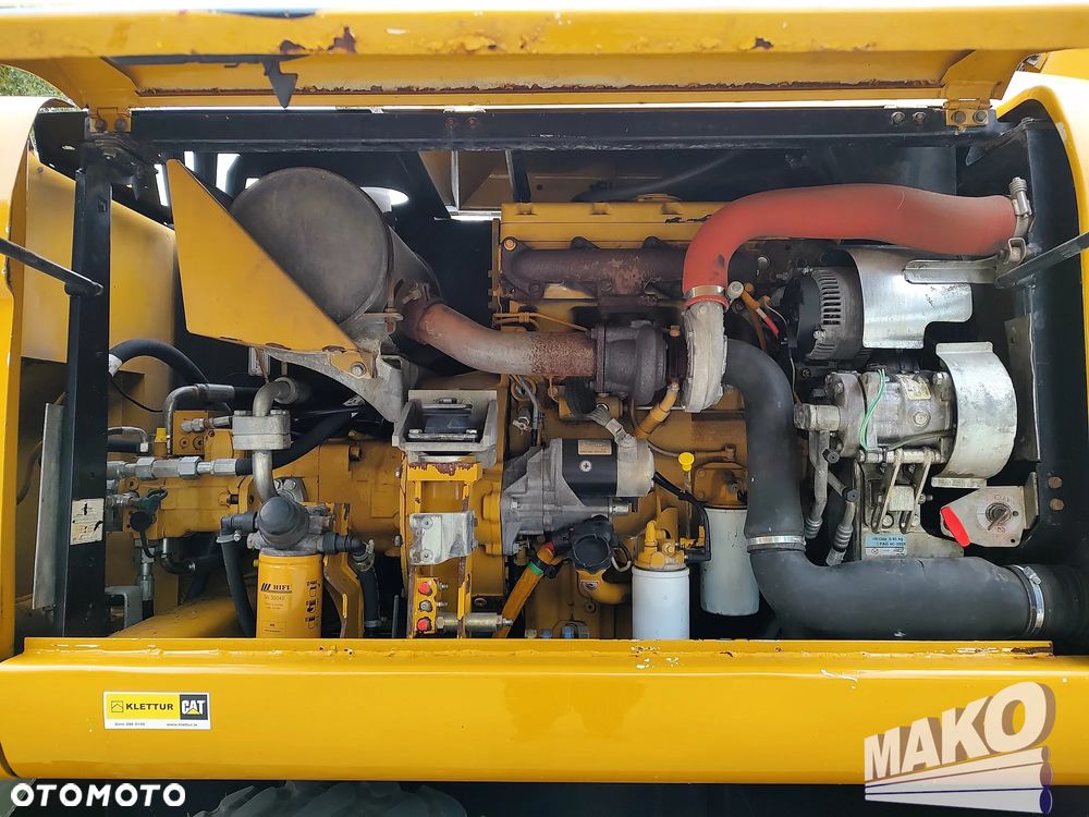 Caterpillar M313D - 8