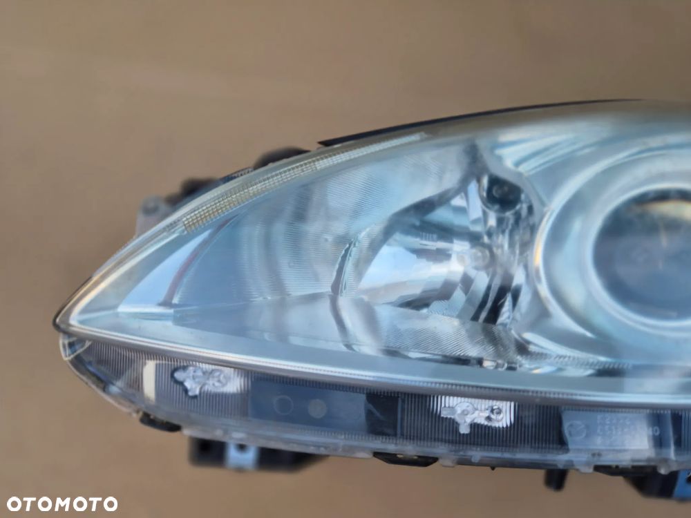 Mazda 5 II lampa lewa.OE.2010-2015. 100% - 2