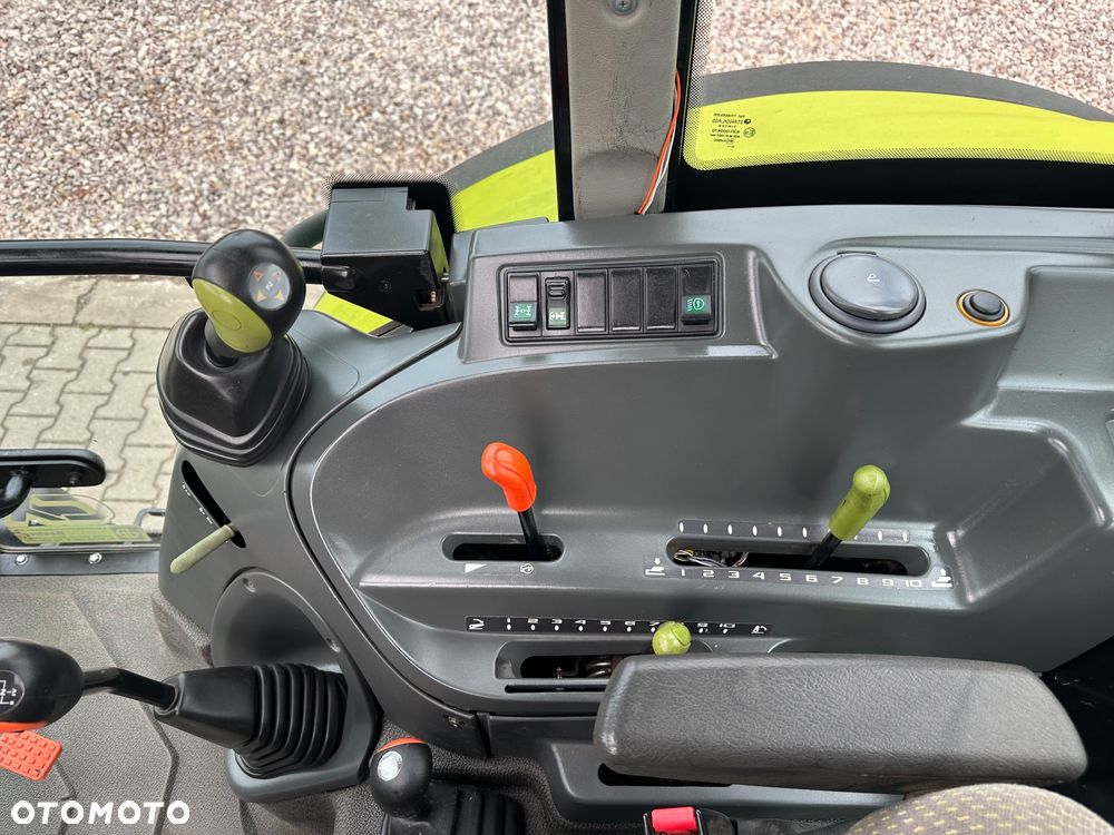 Claas Axos 320 - 15