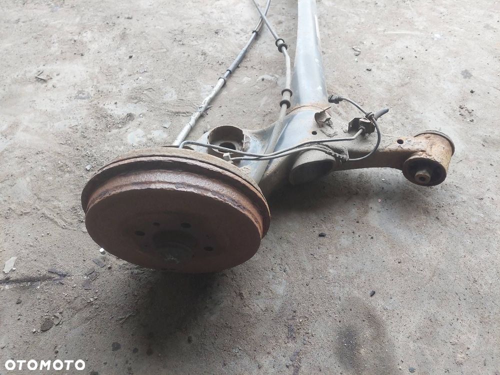 BELKA OŚ ZAWIESZENIA TYŁ BĘBNY Z ABS FIAT PUNTO EVO - 2