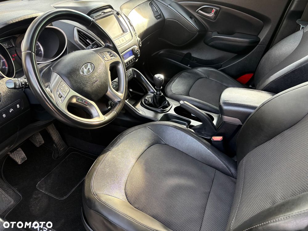 Hyundai ix35 blue 1.6 2WD Finale Gold - 14