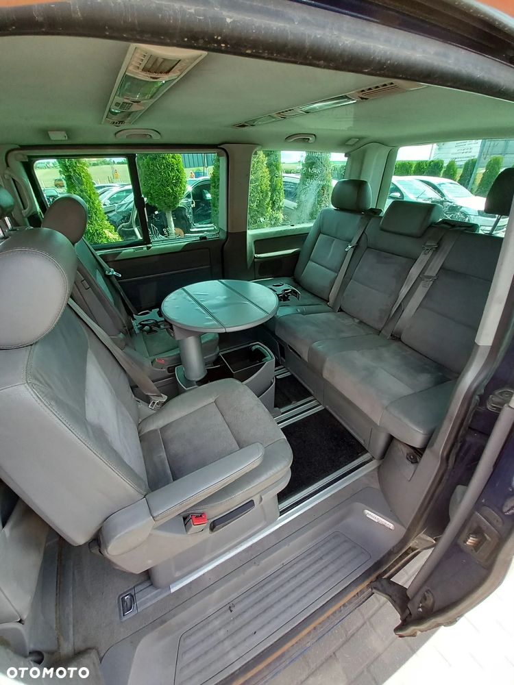 VW TRANSPORTER T5 MULTIVAN KOMPLETNA PRZEKŁADKA FOTELI DYWANÓW PODSUFITKI BOCZKI SŁUPKI NA MULTIVAN KOMPLET Z STOLIKIEM I ROLETĄ SKÓRA ALCANTARA - 1