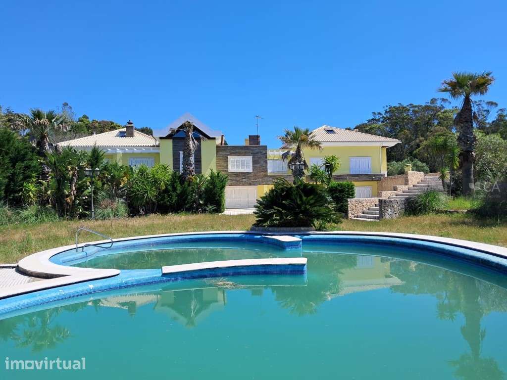Moradia com 1.163,11m² inserida em terreno com 4.857m², situada em ... - Grande imagem: 4/22