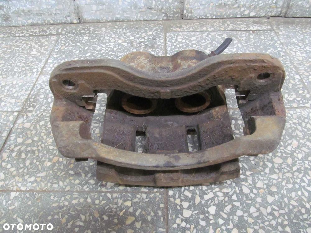 ISUZU N35 N GRAFTER NPR L ZACISK HAMULCOWY PRZOD LEWY 07-18 - 2