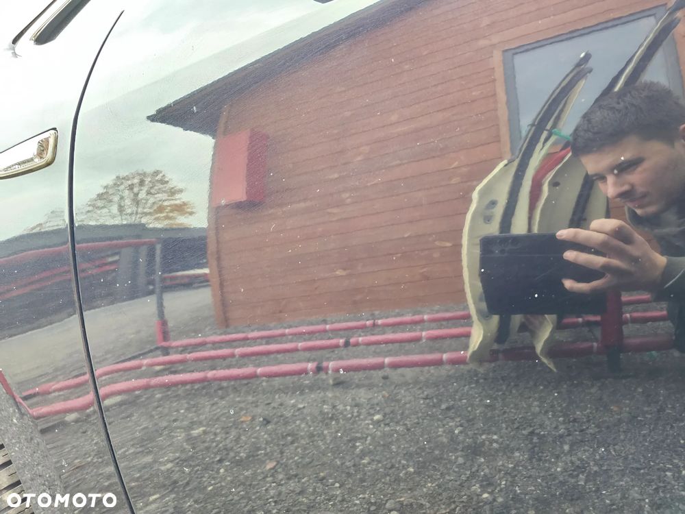 BŁOTNIK LEWY PRZÓD PRZEDNI OPEL ASTRA J Z20R - 20