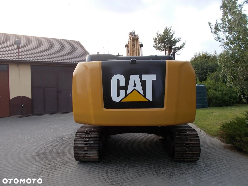 Caterpillar 323E - 4