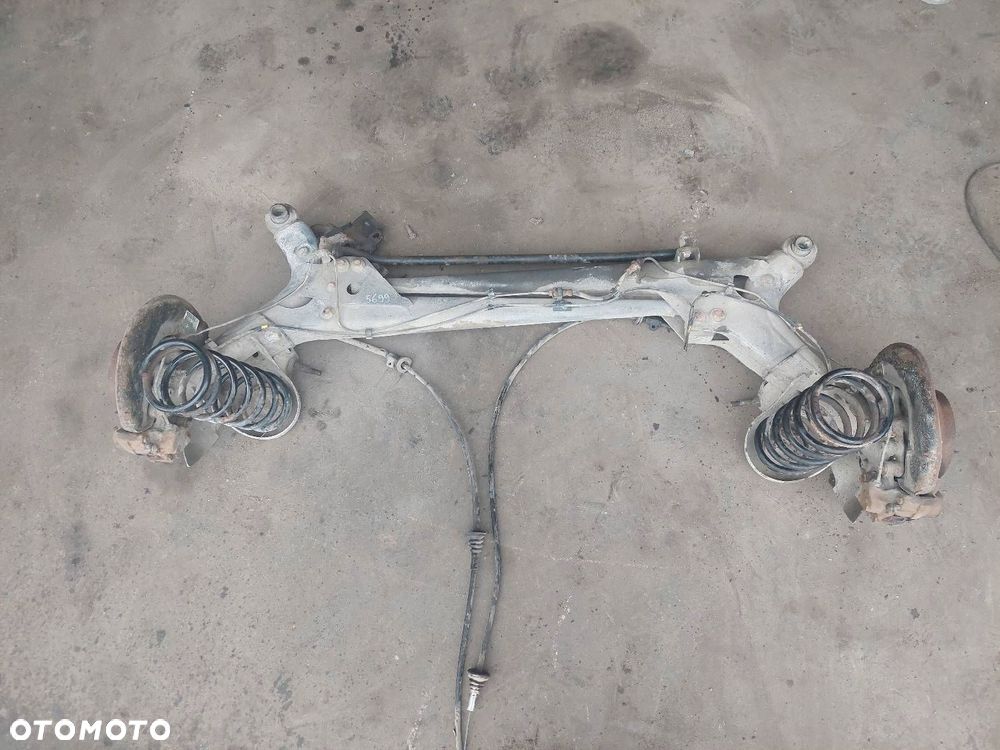 BELKA OŚ ZAWIESZENIA TYŁ TARCZE Z ABS VOLVO 850 I P9140143 - 1