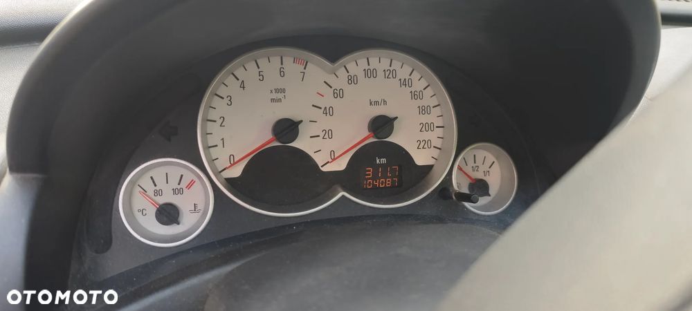 Opel Corsa 1.2 16V Sport - 11