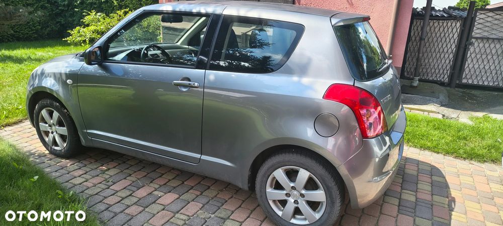 Suzuki Swift 1.3 Club - 9