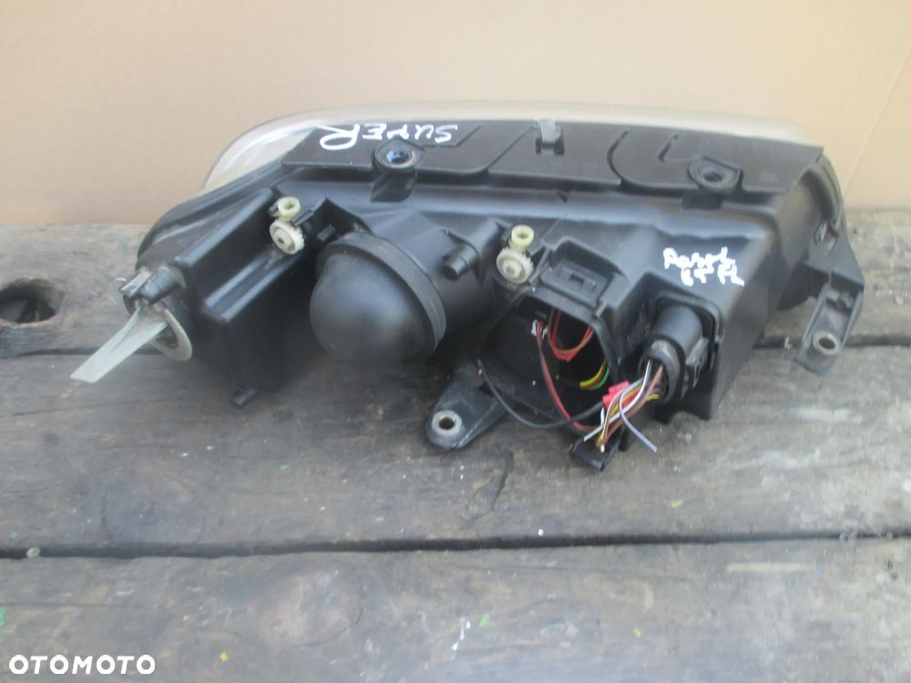 lampa lewa Passat B5 lift Hella Europa - 4