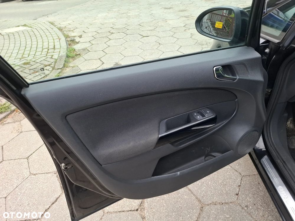 Opel Corsa 1.4 16V Essentia - 9