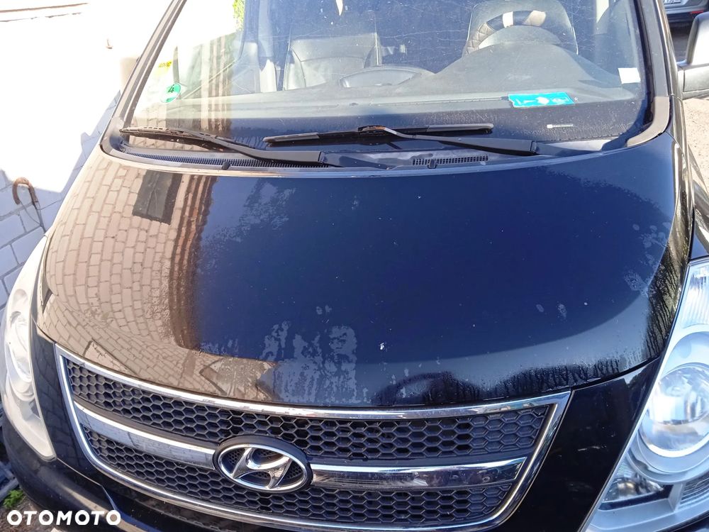 Na części Hyundai H1 II Wagon 2.5 CRDI 2010 lakier NBA silnik D4CBA skrzynia biegów GZ04 maska klapa drzwi przesuwne zderzak lampa błotnik fotel kanapa 7 miejsc szyba - 3