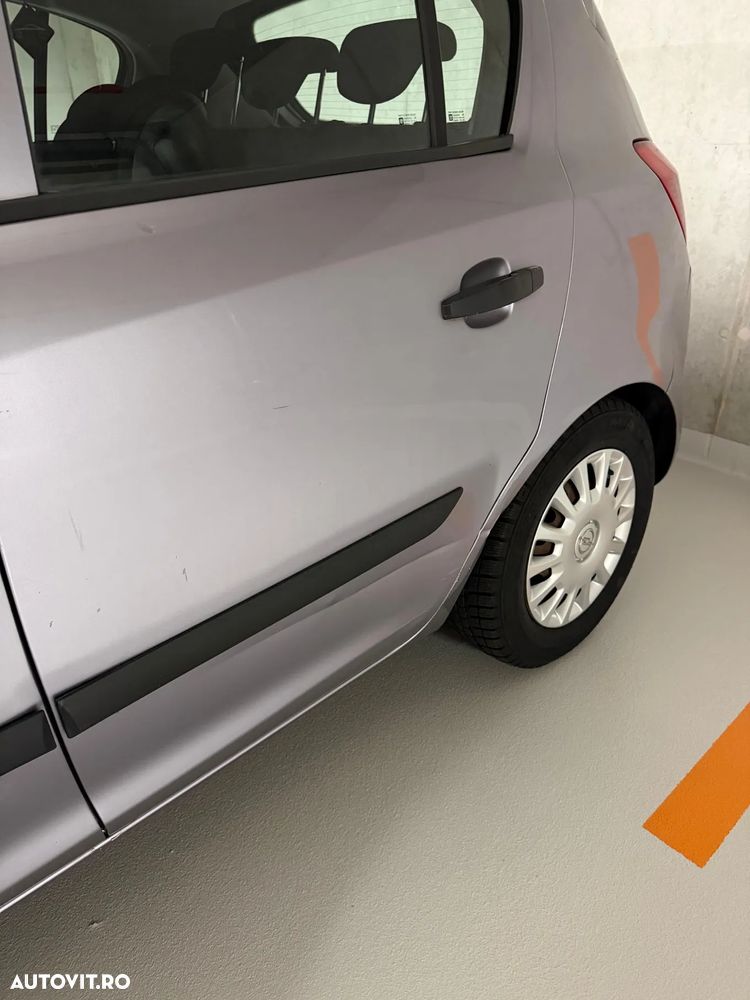 Opel Corsa 1.2i Cosmo - 14