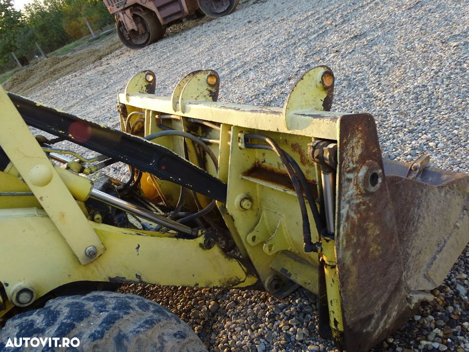 Buldoexcavator Case 580 SK,  din  95  piese - 6
