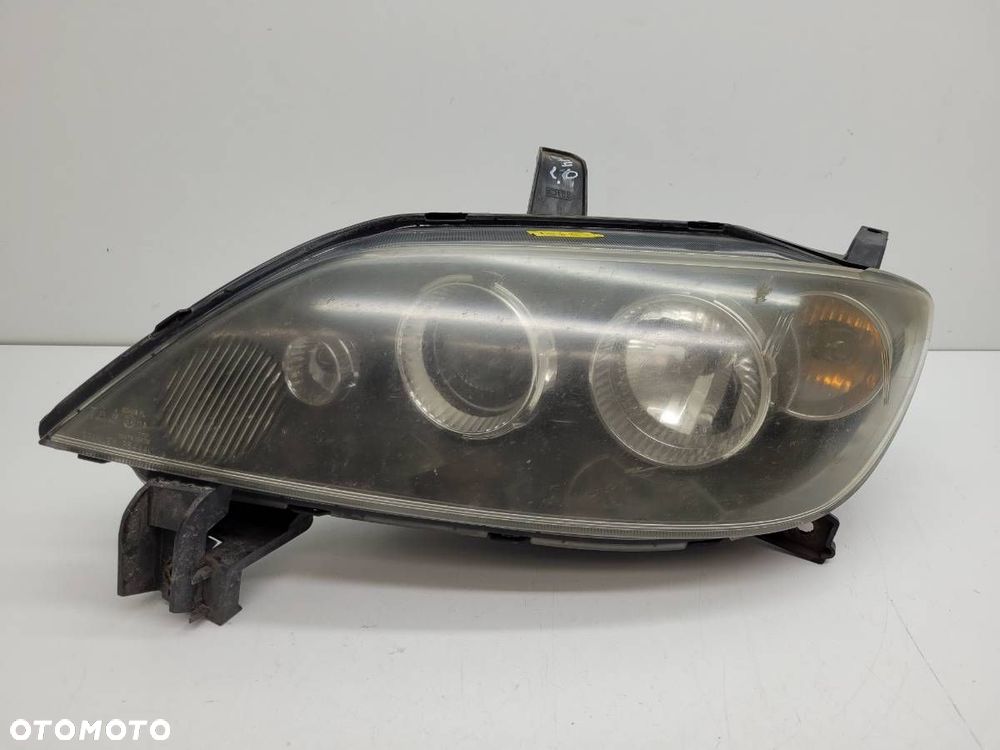 REFLEKTOR LEWY LAMPA LEWA MAZDA 2 DY 6M71-13W030-AE EUROPA SOCZEWKA - 1