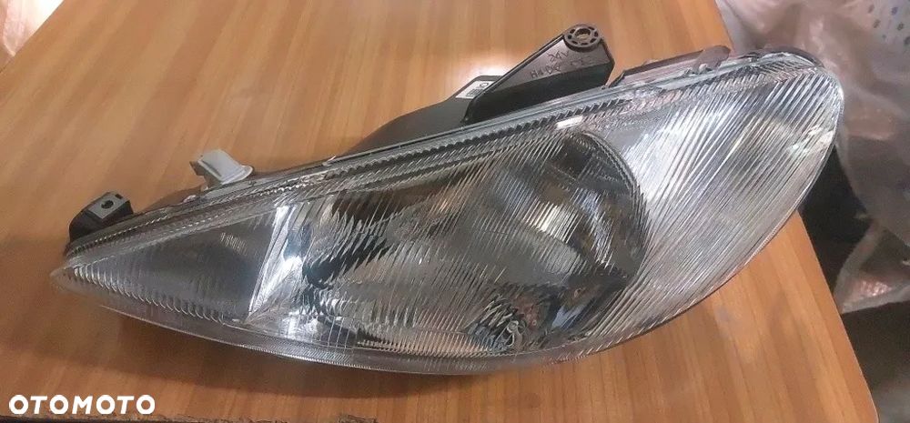 Peugeot 206 Reflektor Lewy 572309-V - 7