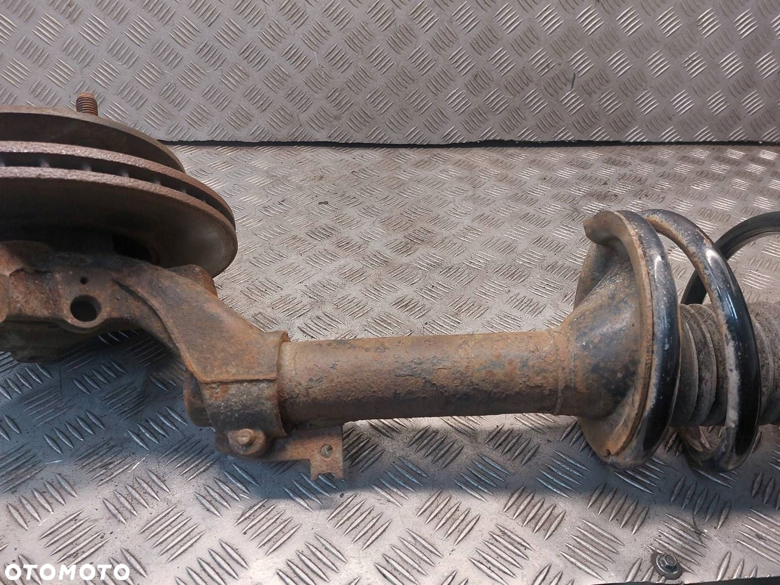 AMORTYZATOR SPRĘŻYNA ZWROTNICA LEWY PRZÓD  FORD TRANSIT V 2.0 DI - 8