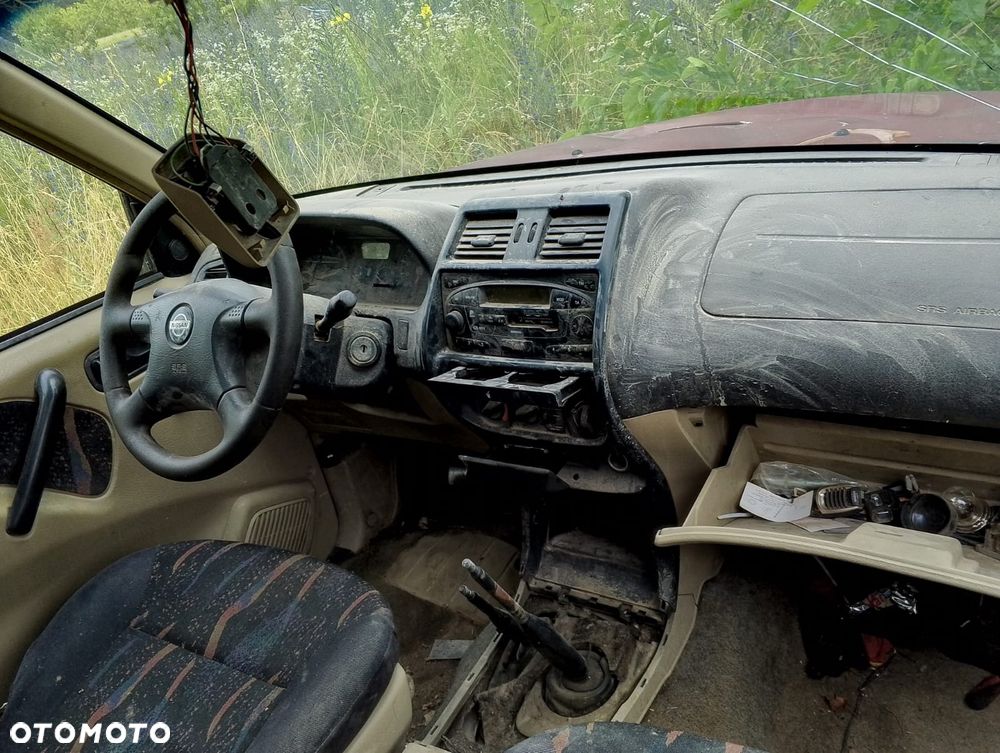 Nissan Terrano (86-06r.) 2.7 B 125KM. Silnik TD28TI Skrzynia . Cały na części. GWARANCJA !!!  Przód Tył Zestaw Komplet Drzwi Klapa Zderzak Błotnik Maska Grill Atrapa Szyba Pas Lampa Lusterko Boczki Fotel Kanapa Kokpit Deska Rozdzielcza Przełącznik Włącznik Sterownik Przewody Wiązka Instalacja Moduł Komputer Czujnik Listwa Pompa Alternator Wtryski Głowica Rozrusznik Kompresor Sprzęgło Dwumas Silnik Skrzynia ABS Klimatyzacji Paliwa Wspomagania Kolektor Turbina Przepustnica Zawór Chłodnica Koło Hak Belka Sanki Zawieszenie Mcpherson Półoś Amortyzator Wydech Tłumik Zacisk Most - 5