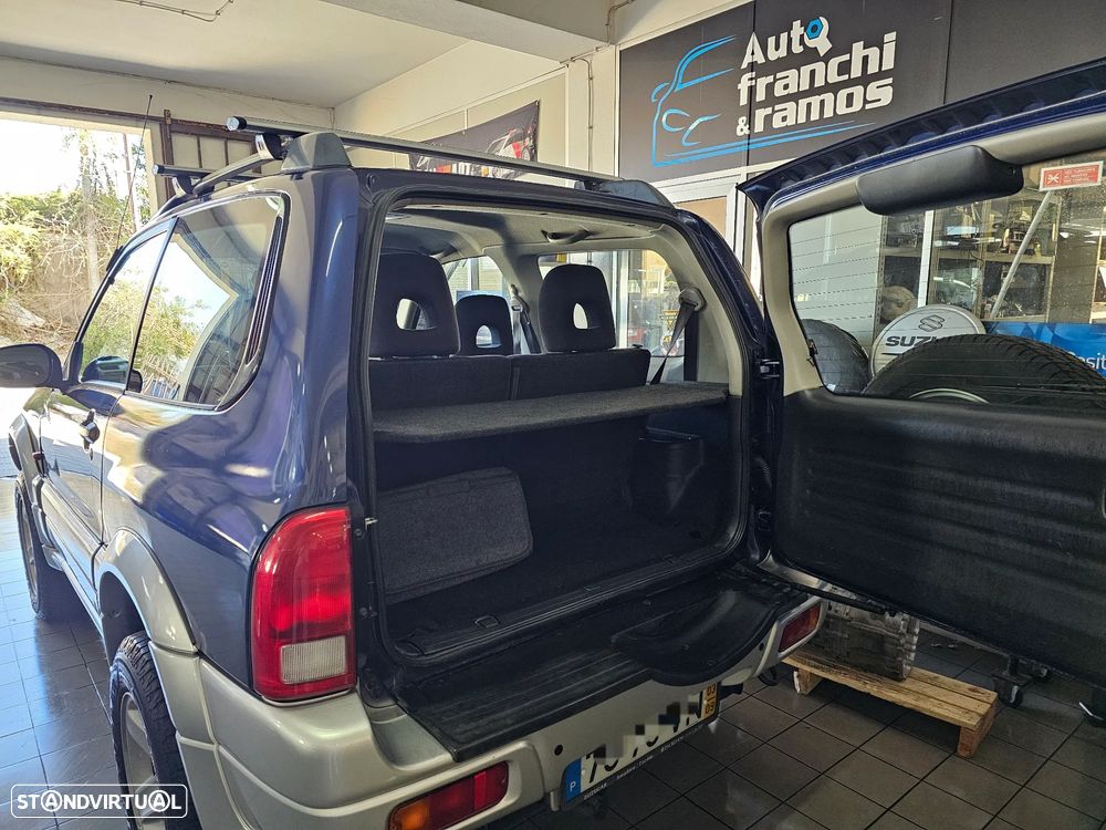 Suzuki Grand Vitara Metal Top 1.6 - 7