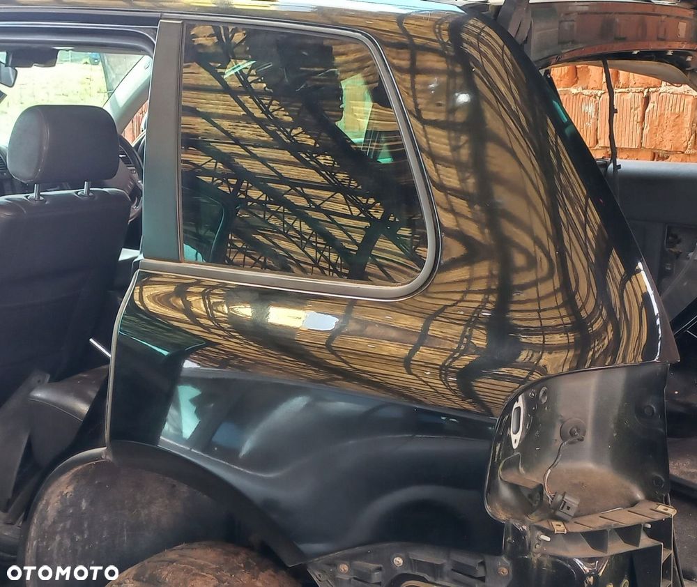 BŁOTNIK TYLNY LEWY VOLKSWAGEN TOUAREG I