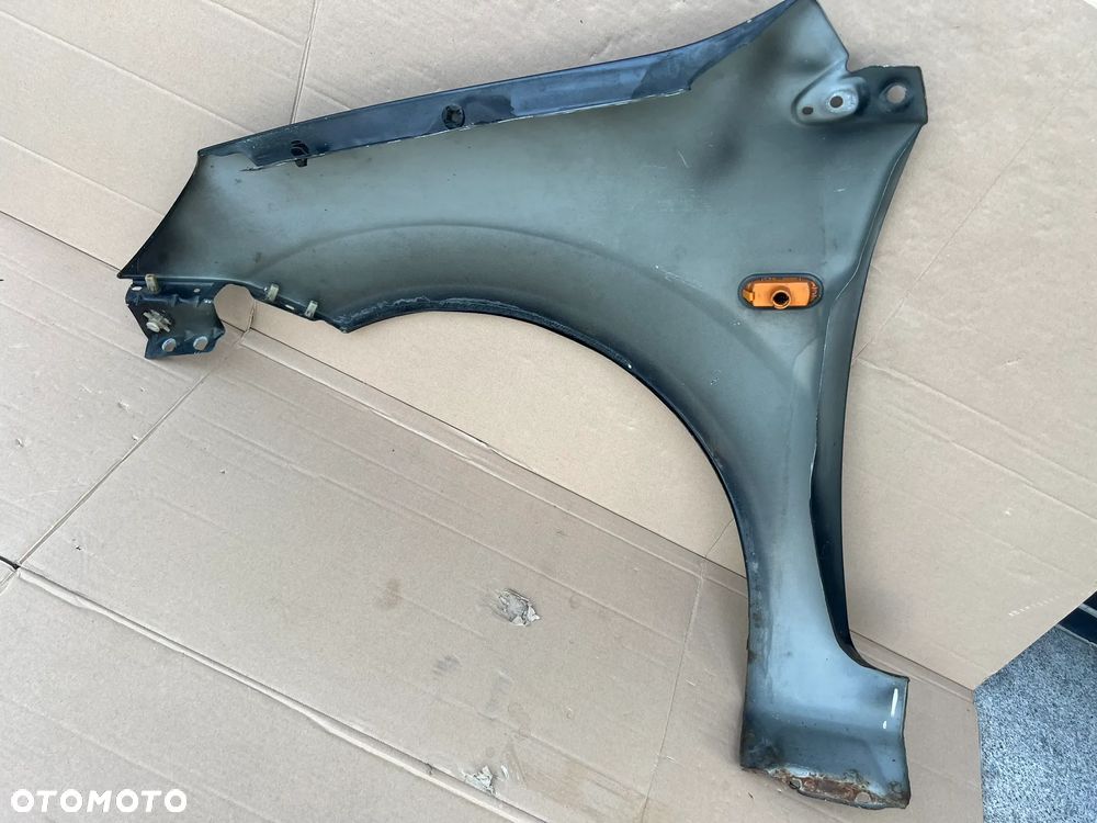BŁOTNIK PRAWY PRZÓD FORD FIESTA MK6 5D 02- - 3