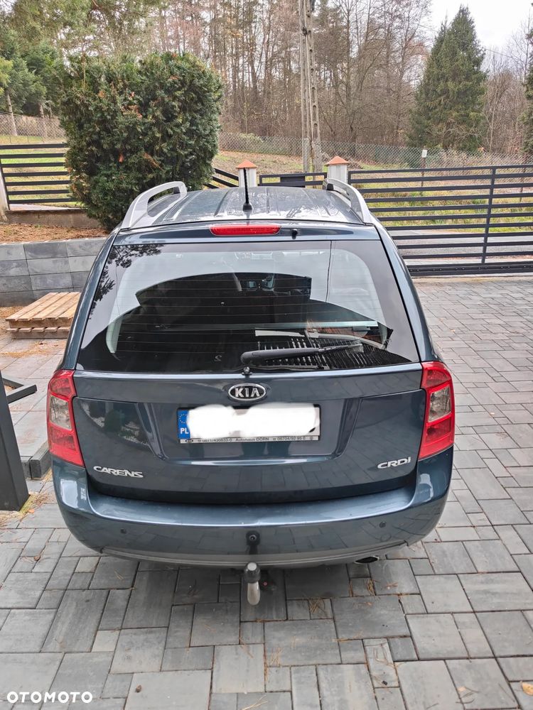 Kia Carens - 4