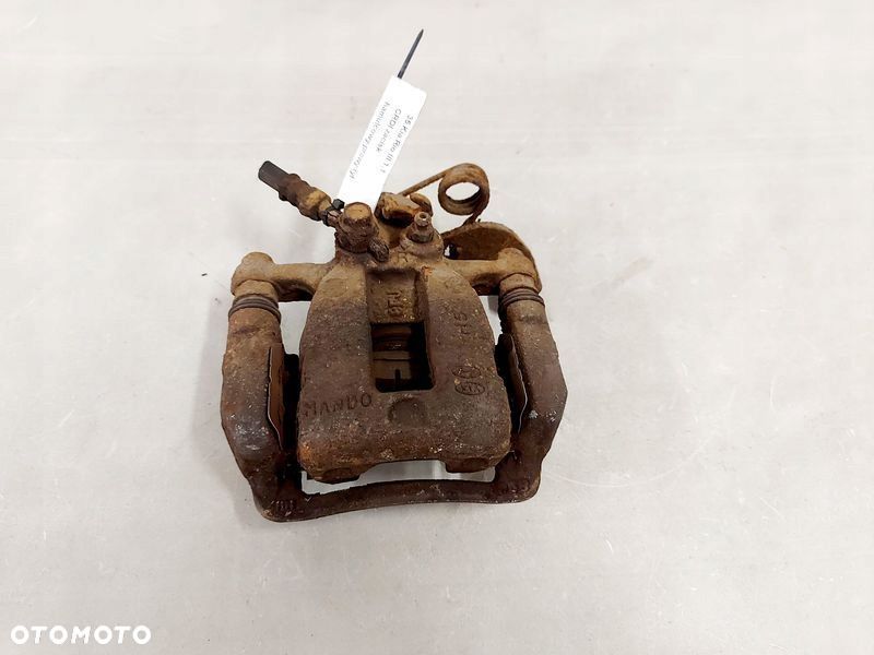 rio iii 1.1 crdi zacisk hamulcowy prawy tył jarzmo - 1