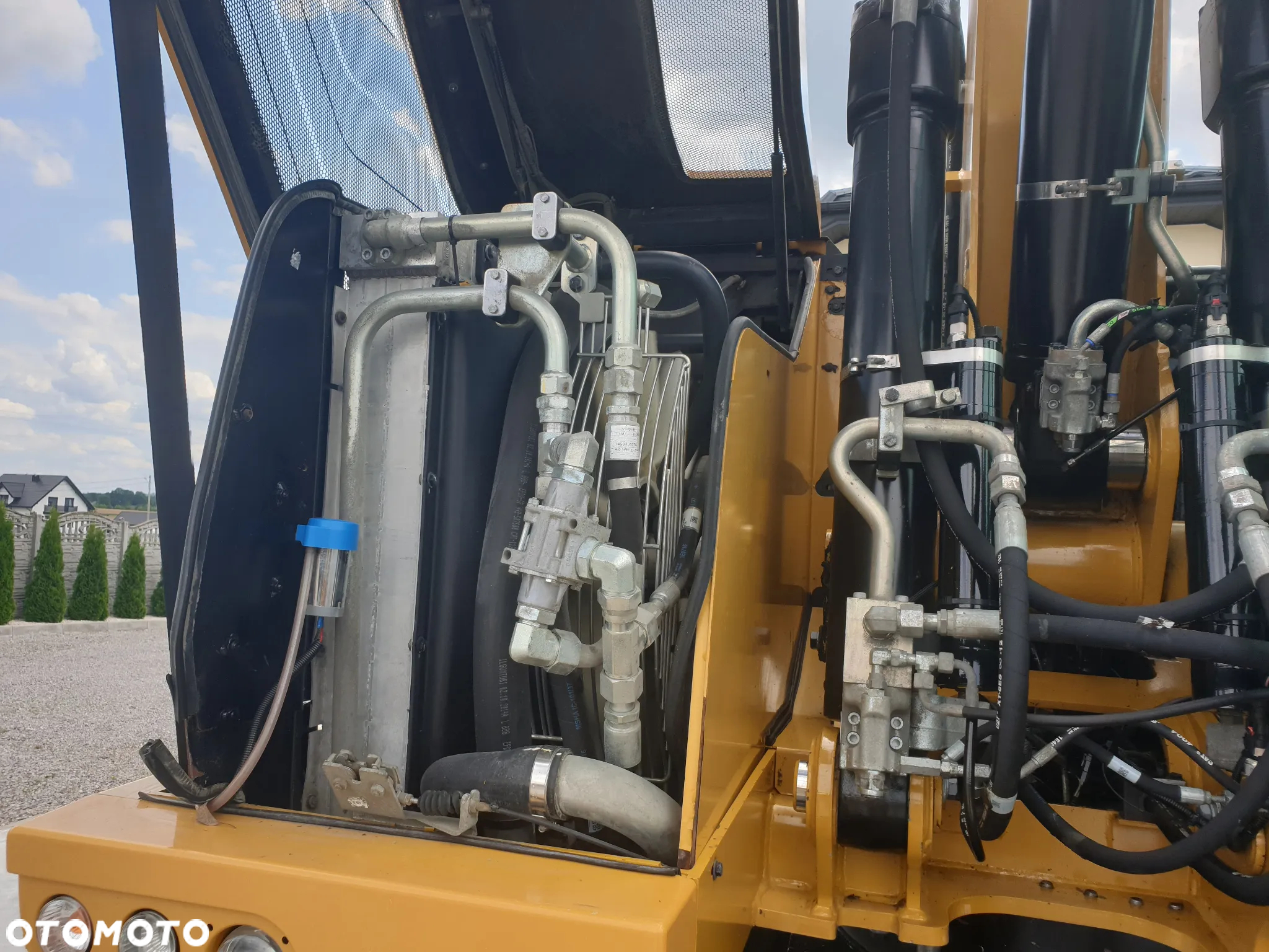 Caterpillar M 318 F ROTOTILT SPROWADZONY ŁADNY STAN - 29