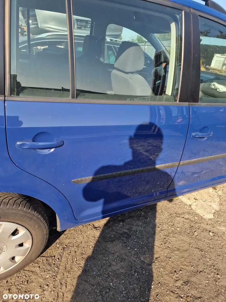 Drzwi prawy tył vw touran 04-15 w kolorze LL5M - 2