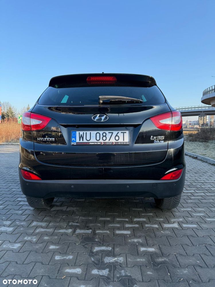 Hyundai ix35 1.7 CRDi 2WD blue Finale Gold - 12