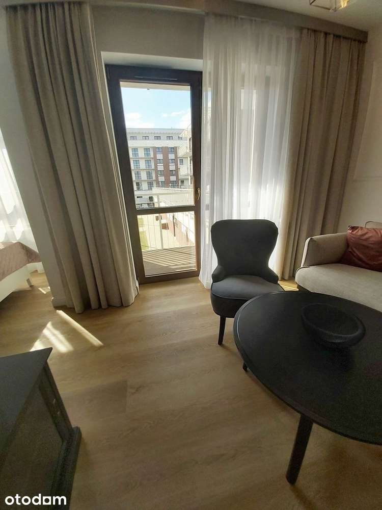 Komfortowy apartament z balkonem i garażem