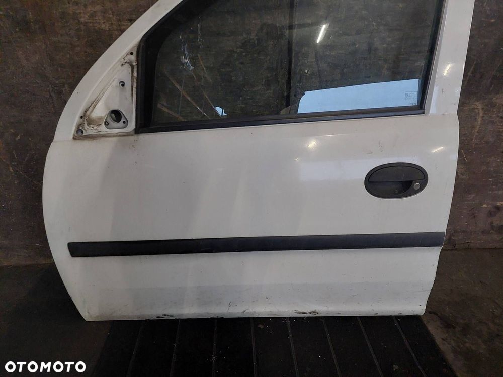 DRZWI KOMPLETNE LEWY PRZÓD OPEL COMBO C L474 - 2