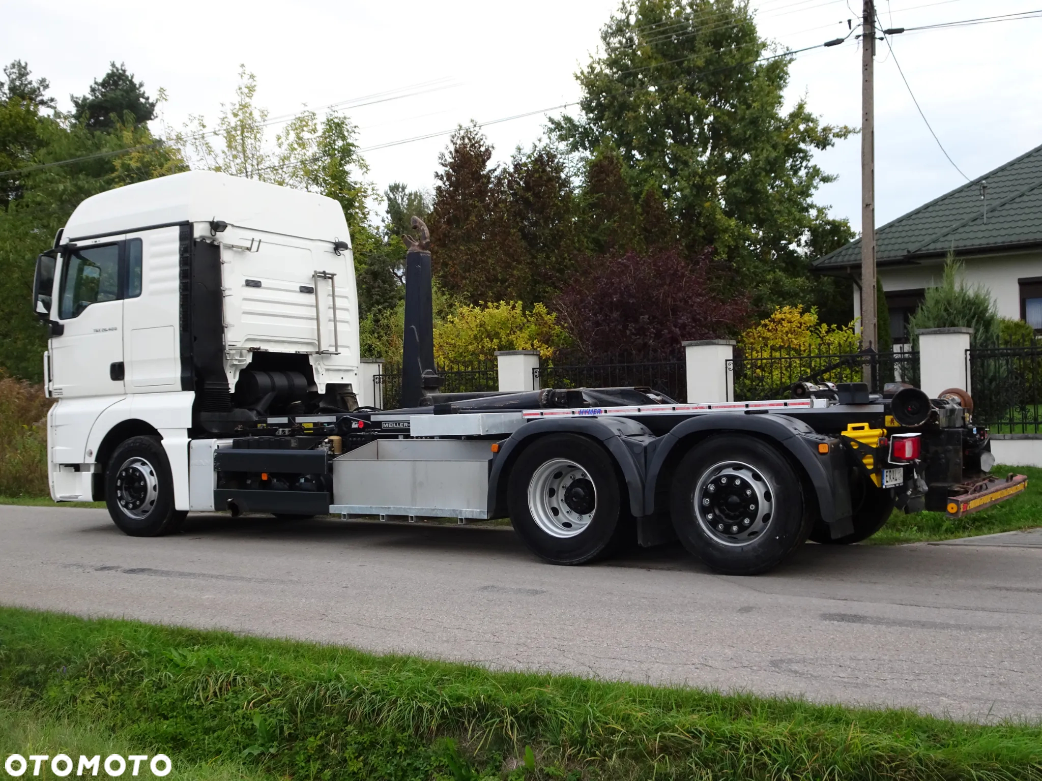 MAN TGS 26.440 6x2 hakowiec Meiller RK 20/70 idealny mały przebieg os skretna - 6