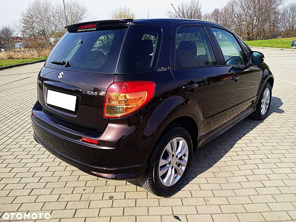 Suzuki SX4 1.6 Comfort Plus - 12