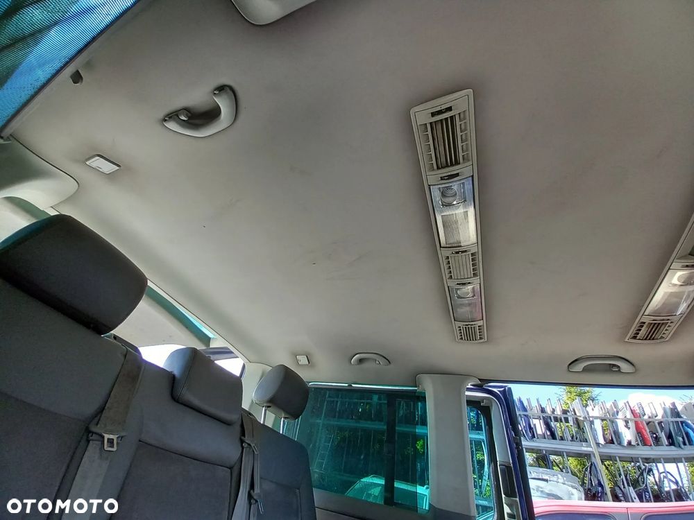 VW TRANSPORTER T5 MULTIVAN KOMPLETNA PRZEKŁADKA FOTELI DYWANÓW PODSUFITKI BOCZKI SŁUPKI NA MULTIVAN KOMPLET Z STOLIKIEM I ROLETĄ SKÓRA ALCANTARA - 18