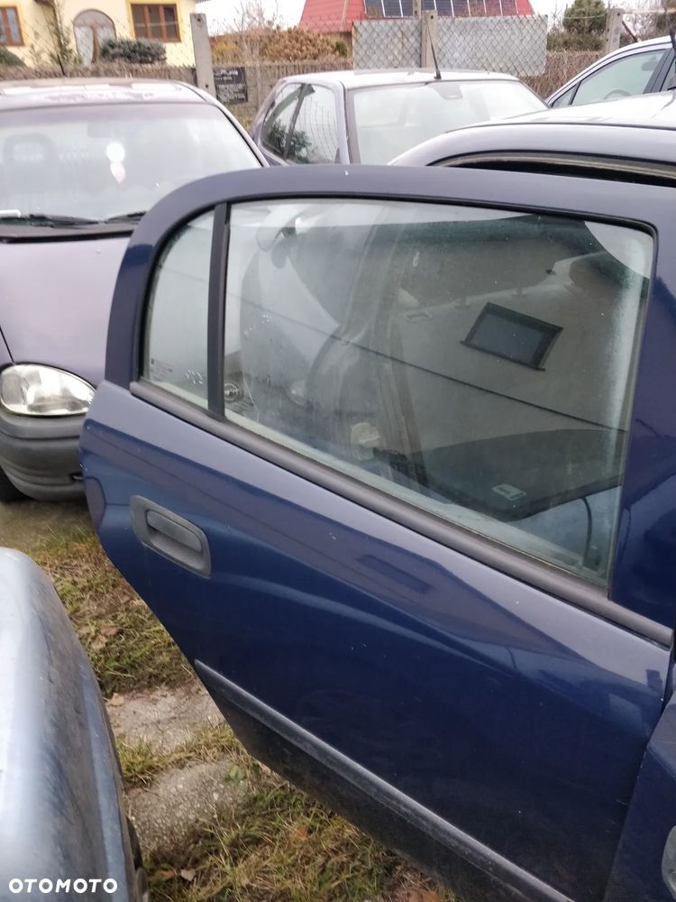 drzwi kompletne prawy tył Opel Astra G 5D