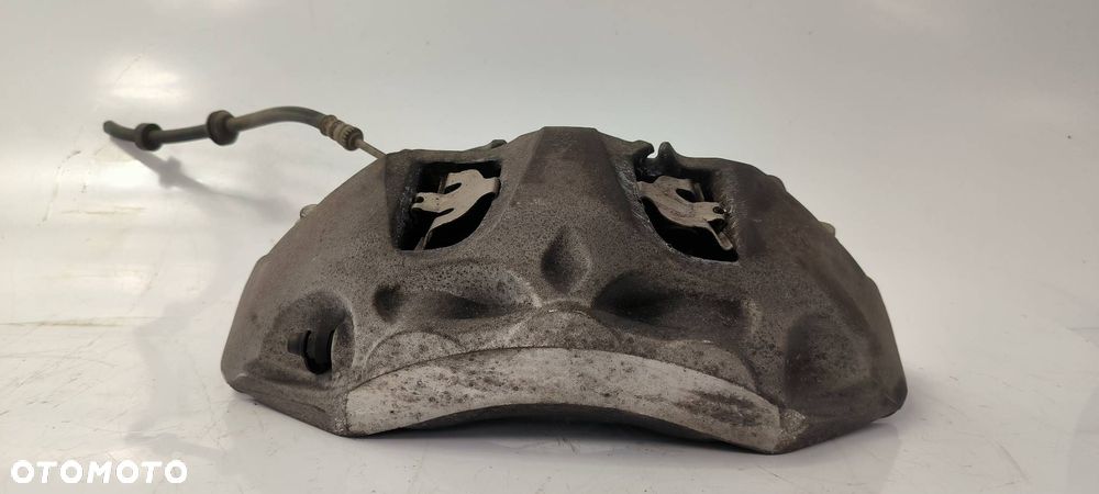 ZACISK HAMULCOWY PRZÓD LEWY AUDI Q7 II 4M 4M0615105 - 2